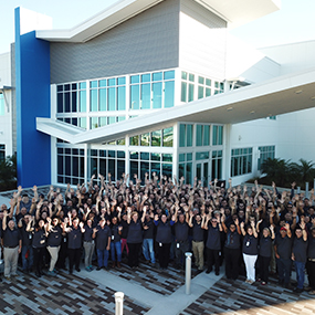 Staff team in front of the iTD building in Odessa, Florida